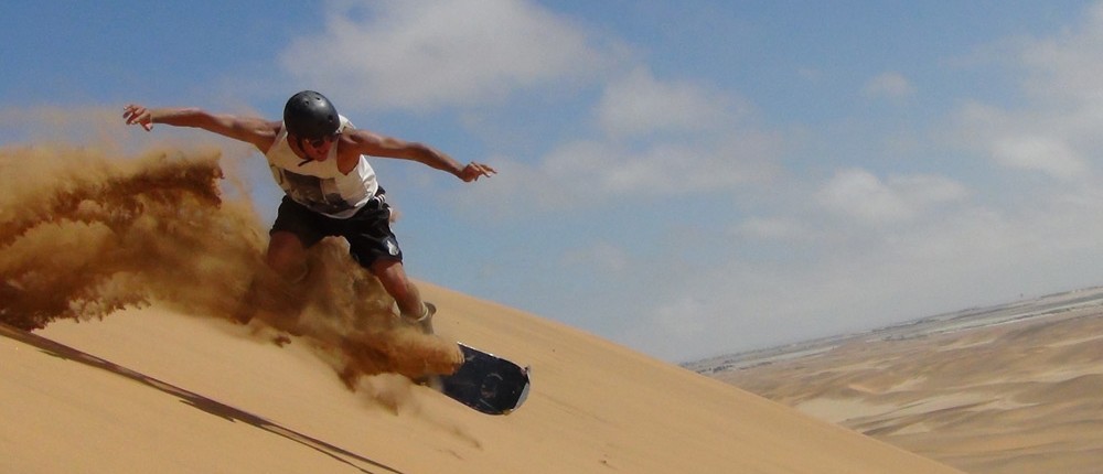 Sand boarding in Namibia